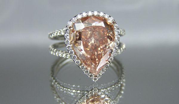 Pear shape Pink Diamond in halo setting on double shank micropave ring handmade in platinum