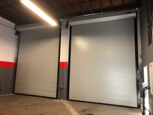 Two heavy duty rolling steel doors we installed for a mechanic shop