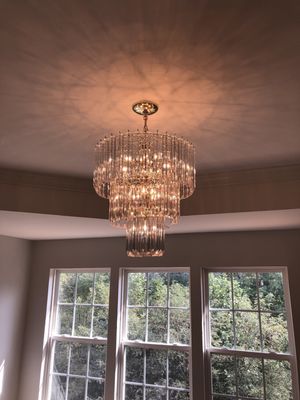 Chandelier installation by Salone Solutions LLC.