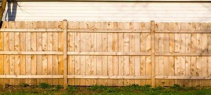 We use real 2 x 4 rails. This is the back side of a stockade fence.