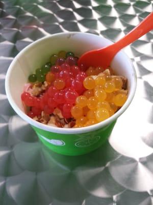 Spoons frozen yogurt. .43 cents per Oz.