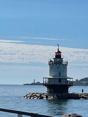 The tour guide describe the history of each of the light houses.