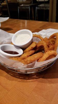 Onion ring with bbq sauce and parmesan ranch sauce