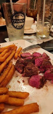 Filet mignon with fries and cucumber mint fizz