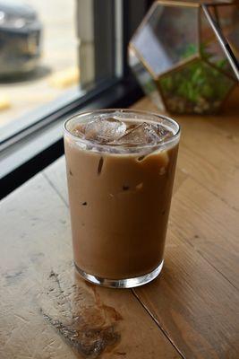 Iced latte w/ oat milk and mocha syrup ($4.95)