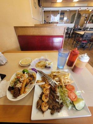 Yucca Fries with Pork on left, Papusa at the top middle and Chicken, Shrimp and Steak with Fries.