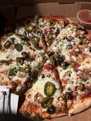 Pro Special with jalapeños and green olives added on hand tossed crust