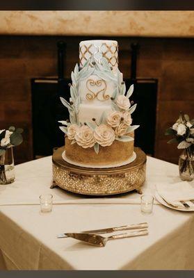 Our wedding cake with custom emblem. Was three flavors