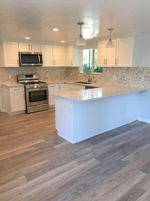 Studio City, Ca. Large kitchen remodel and design. New layout, cabinets, countertops, appliances, peninsula, flooring.