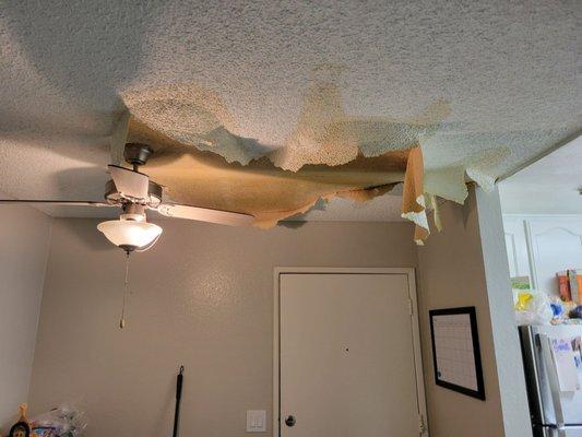 Broken ceiling due to water