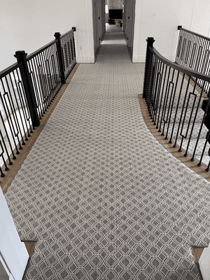 Binding both side hall runner designed and installed by Aladdin Carpet & Floors