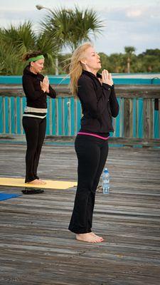 Sun Salutation Class lead by Master Teacher, Suzanne Elliott, at Sunrise at our Women's Yoga Retreat at International Palms Cocoa Beach