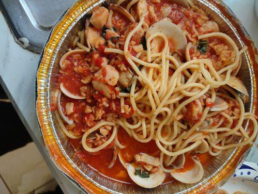 Spaghetti with red clam sauce