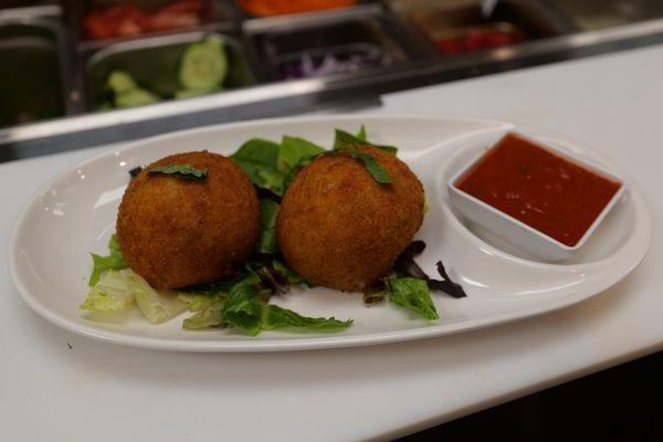 Sicilian rice balls with risotto, beef Ragu, mozzarella, served with our homemade marinara sauce