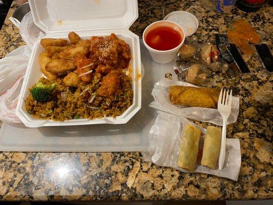 D. Sweet and Sour Chicken and Sesame Chicken, egg roll, and an order of spring rolls(2)