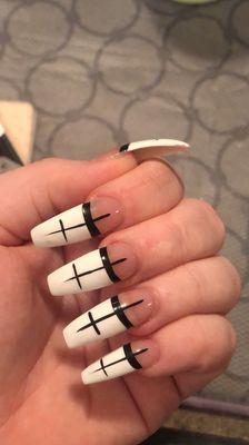 Half of the nails curve outward.