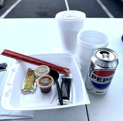 Getting condiments & drinks together for our to-go order