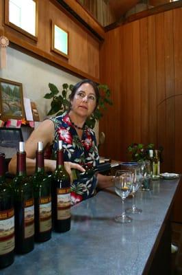 Dolores Mast (owner) pouring wine