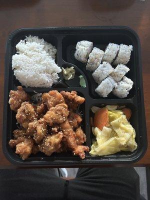 sesame chicken bento box with gyoza (gyoza not in picture)