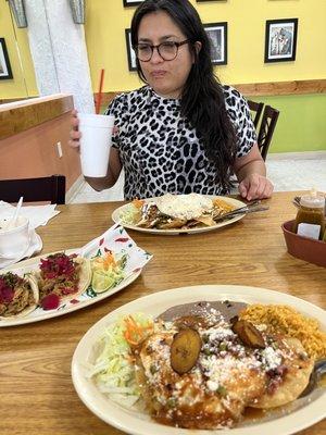 Agua de tamarindo, Chilaquiles crujiente with medium fried egg, huevos motulenos and tacos de cochinita. So delicious!