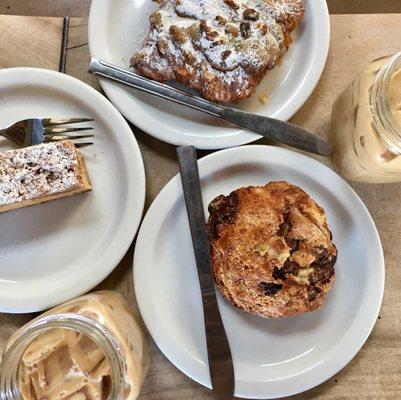 Iced Lattes, coffee cake, pistachio croissant, chocolate raspberry scone.