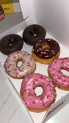 Half dozen donuts - chocolate glazed x2, strawberry icing x2, choc and vanilla icing