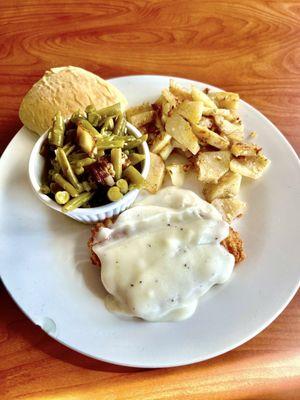 Chicken fried chicken, green beans with bacon, German fries and a roll. $7.99 !