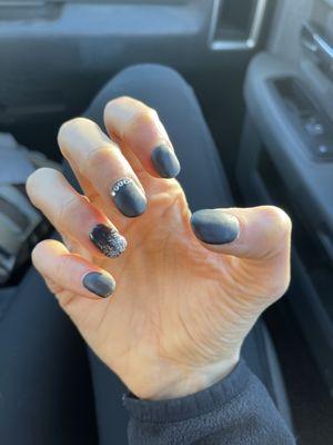 Matte black with hombre glitter and crystals