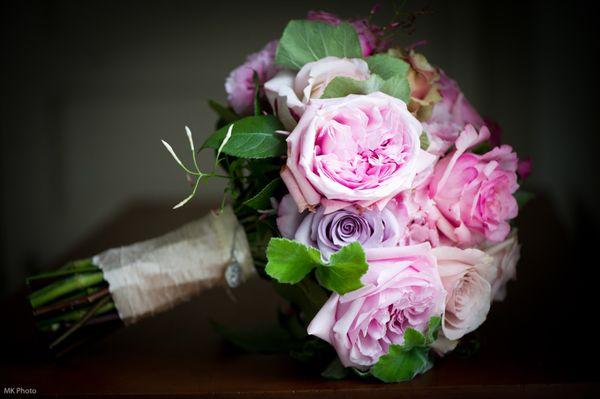 A Compact Bouquet of Pinks and Purples to easily bring out the girly girl in you!