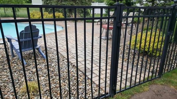 Aluminum fences give the classic look and feel of wrought iron fencing, but are generally less expensive.