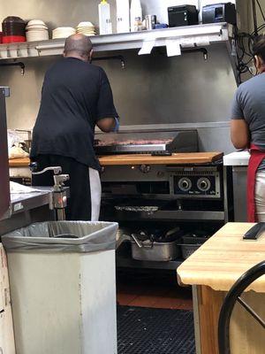 Happy Burgers on the cooktop.