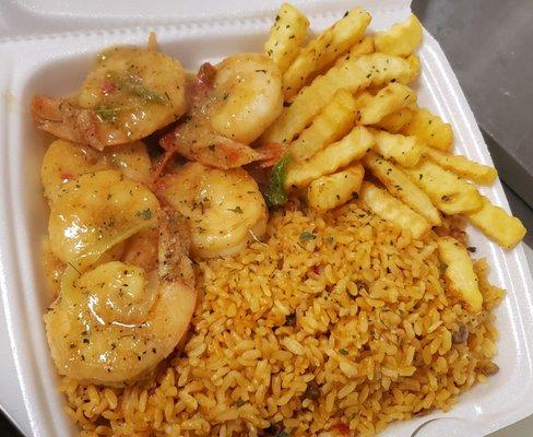 Arroz con gandulez with shrimp in criolla sauce and French fries..