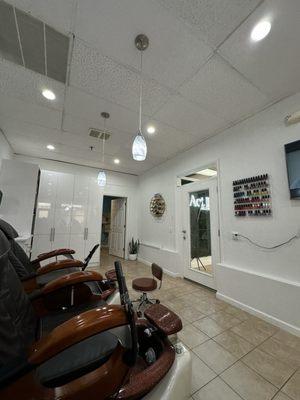 Pedicure chairs - tv in front. Pedicure baths and lined and have a massage aspect for your back