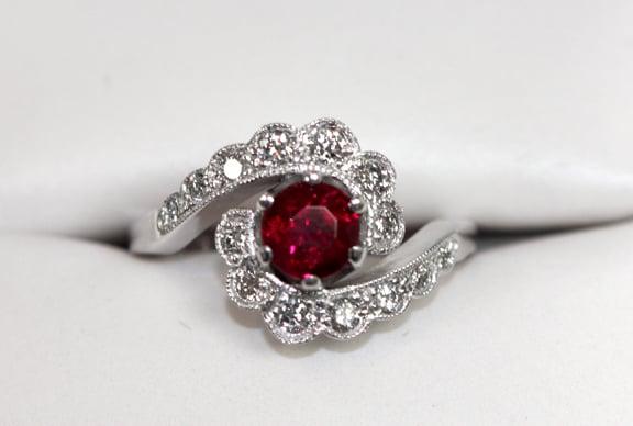 Custom Ruby & Diamond Engagement Ring in 14K White Gold.  A milgrain design was added to give an old-world feel.