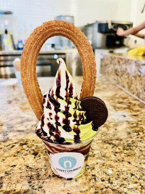 Ice Cream Churro (cinnamon churro w/ vanilla & matcha soft serve + chocolate drizzle)