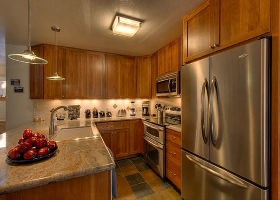 Carnelian Bay - Carnelian Woods condo #63 fully stocked kitchen. BBQ gas grill is on the patio which was great. Double oven.