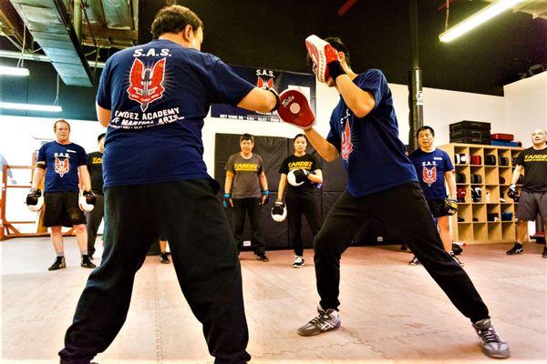 Learn Boxing for self-defense in our JKD group classes @ Tandez Academy.