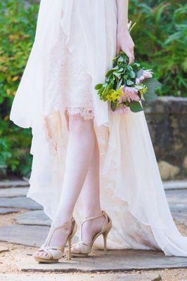 Hi-low blush gown detail featuring French lace