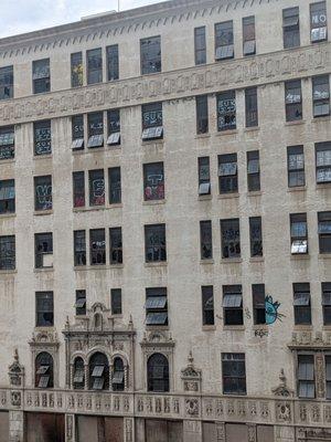 I'm just curious how they got graffiti on the outside of the windows. Building across the street from the plaza deli.