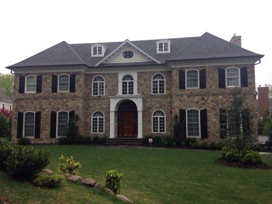 One of my favorite projects. We supplied the large custom cedar shutters on this job in Manhasset.