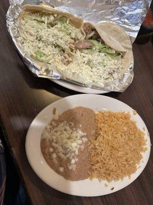 Two taco dinner, Chicken taco and pork taco in soft corn (flour was a choice) Corn Tortillas, plus rice and beans, Horchata to drink.