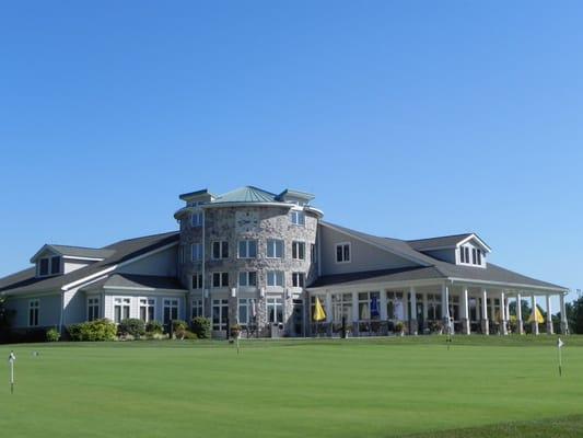 The renovated clubhouse and putting green.