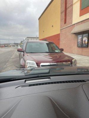 Car parked in pick up/ drop off zone