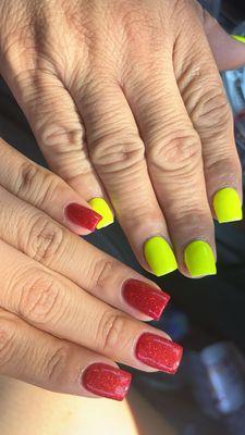 (Old picture) Me & my mom got for summer last year hers are neon yellow. My red nails were so sparkly in sunlight very nice.