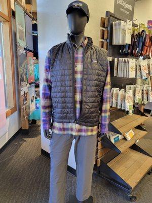 A warm Nano puff vest with a comfortable organic cotton flannel shirt and my Quandry walking, hiking pants.