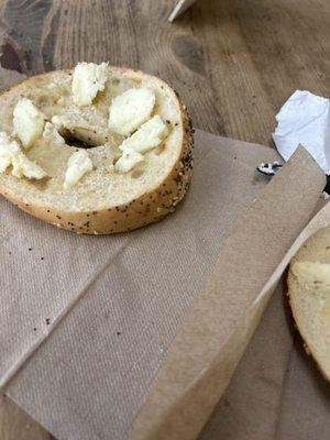 Room temp bagel with butter chunks...