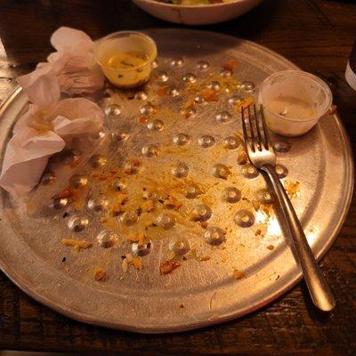 An empty plate because that calzone was so dang good. I couldn't stop.