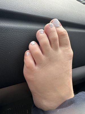 Daughter's white pedicure