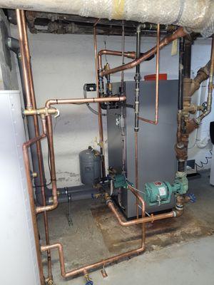 All new pipe work installed to connect with my new H.E. Viessman gas boiler and hot water tank with the existing heating circuit pump.