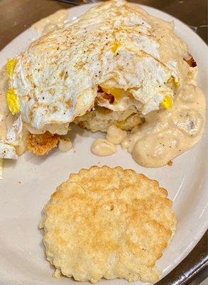 The Cowboy - country fried steak hand battered with pecan wood smoked bacon cheddar and a fried egg! Sausage and shiitake mushroom gravy.